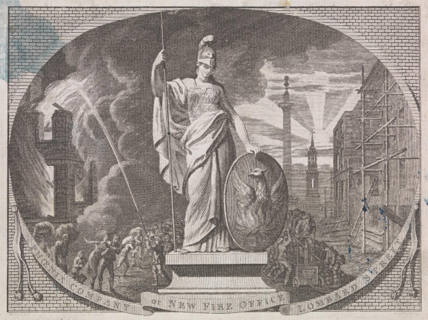 Bronze Statue of Liberty holding a torch and tablet, surrounded by a crowd with buildings and utility poles in the background, under a sky with text at the bottom.