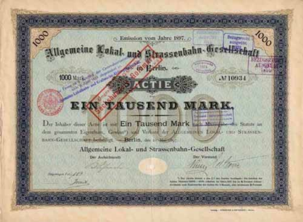 Altes deutsches Aktienzertifikat mit rotem Stempel und Text zur Aktienherkunft.