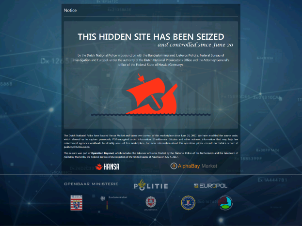 Ein Computerbildschirm mit einer Nachricht, die in fetter, schwarzer Schrift mit weißem Rand und einem Logo der niederländischen Nationalpolizei mit einem blauen Schild und einem weißen Stern in der Mitte angezeigt wird.