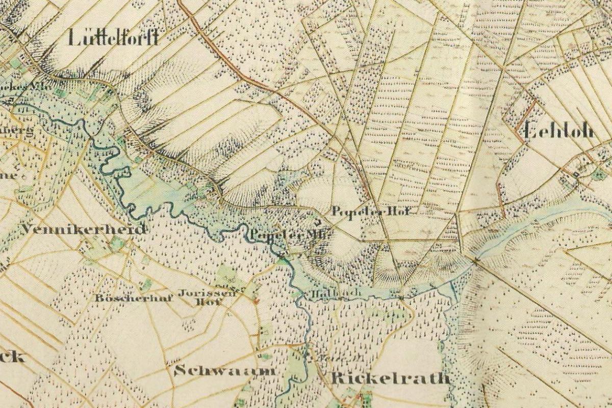 Ein detaillierter alter Stadtplan von Lüttelhof, Deutschland, der Straßen, Gebäude, Parks, Sehenswürdigkeiten und die umliegenden Gebiete zeigt.